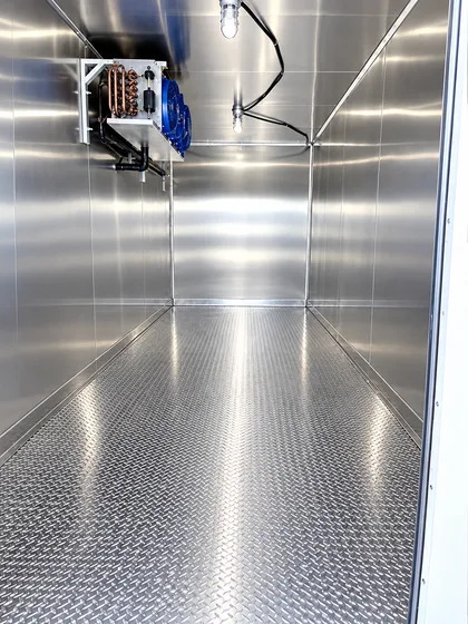 Supplied reference image labelled refrigerated trailer interior cooling system.