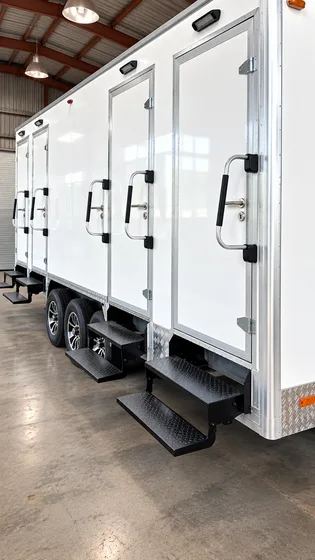 Supplied reference image labelled 22ft 6 stall shower restroom trailer exterior.