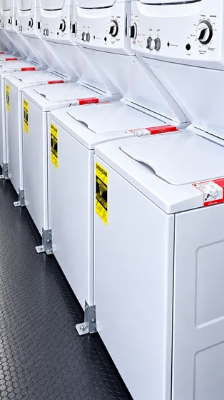 Supplied reference image labelled 24ft commercial laundry trailer washing machines.